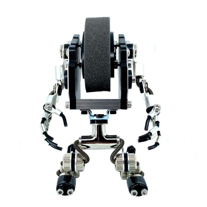 media.nlid9859c7914678hXcFF2VR_-KaBQQMhwAJb-lhNQSe5IAohUk65kNTw3TLomV1A Robot Watch Stand - Image 1